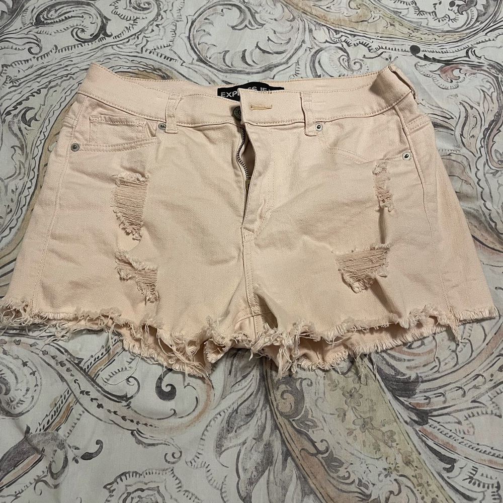 Size 8 Express distressed denim shorts. 2 inch inseam
